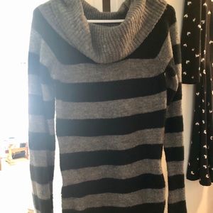 Sweater! Cozy, cozy! Medium weight. Not heavy.